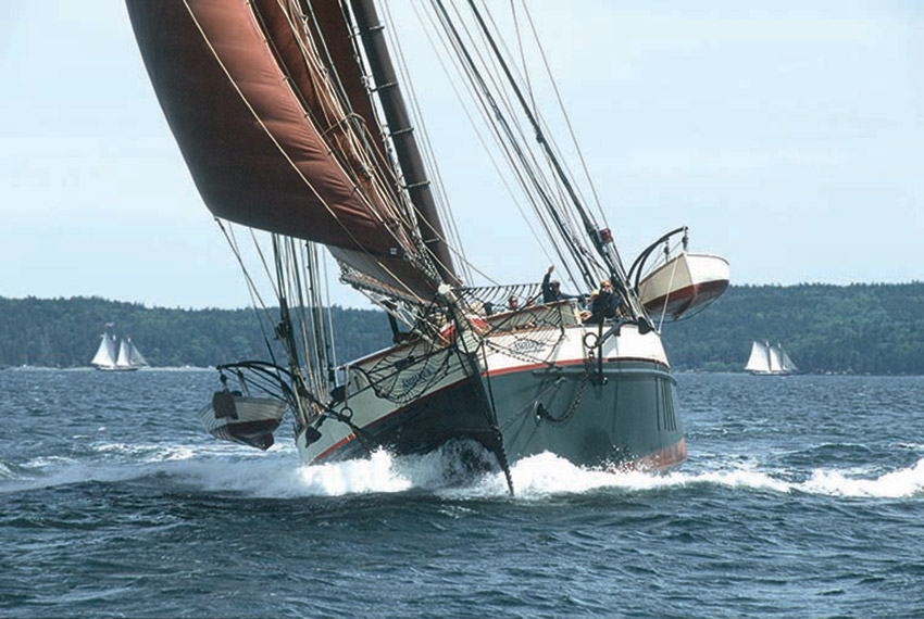 old sailboat coming toward camera